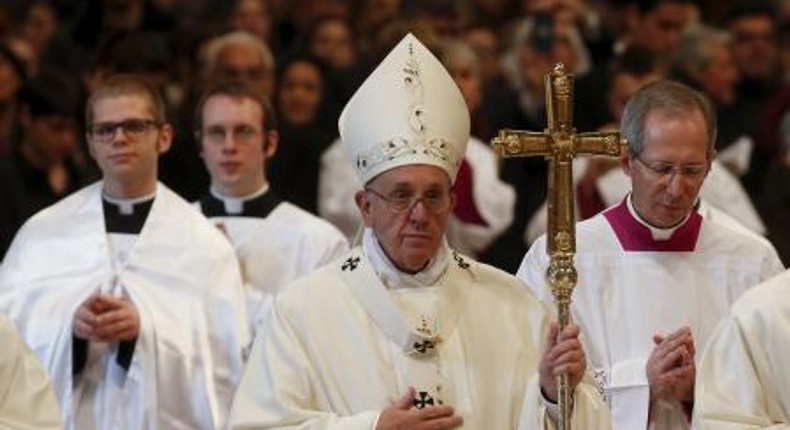 Pope Francis leaves after he leads a holy mass for the family in Saint Peters Basilica at the Vatican, December 27, 2015.