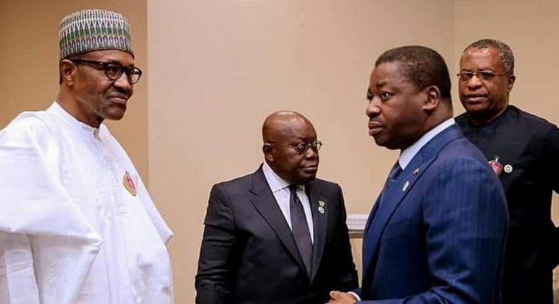 President Muhammadu Buhari (left), Nigeria's Foreign Minister, Geoffrey Onyeama (far right) and two of the West African leaders who are in Abuja for the 52nd ECOWAS Summit.
