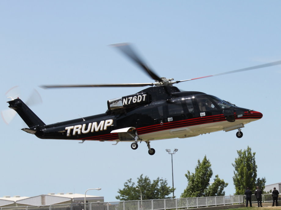 The Trump helicopter landing lakeside.