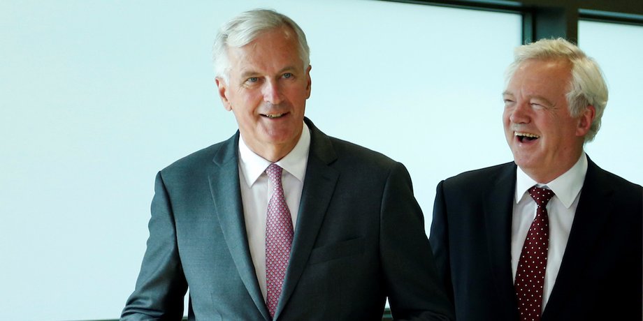 Britain's Secretary of State for Exiting the European Union David Davis (R) and European Union's chief Brexit negotiator Michel Barnier arrive for Brexit talks in Brussels, Belgium August 28, 2017.