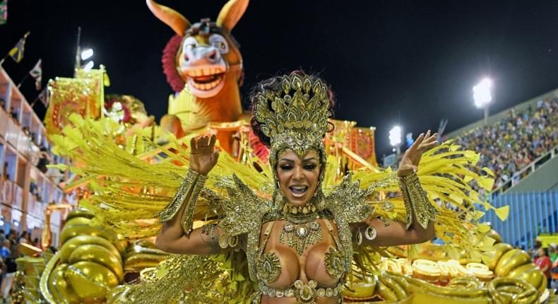 The sumptuous parades and monumental floats attract tens of thousands of tourists to Rio for the carnival every February