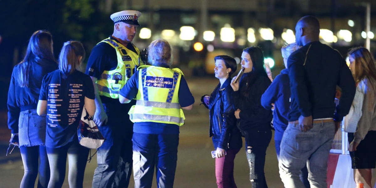 Police and fans close to the Manchester Arena.