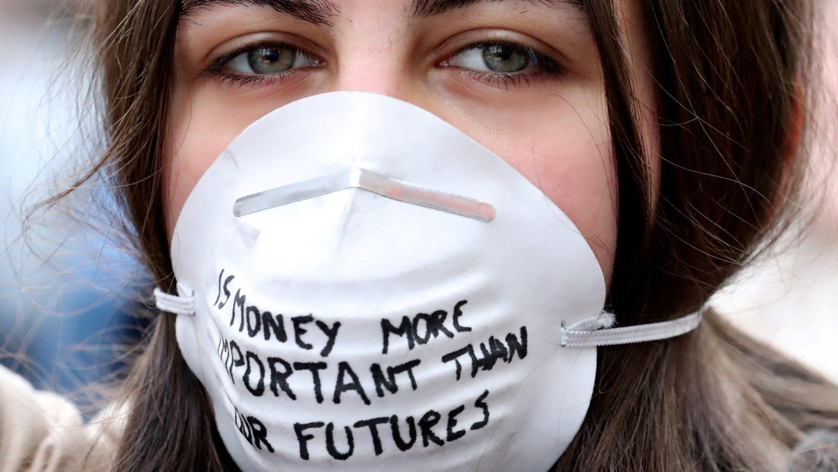 Belgian students claim for urgent measures to combat climate change during a demonstration in centra