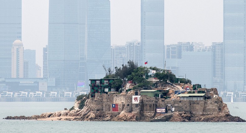 Shiyu, or Lion Islet, one of Taiwan's offshore islands, with the Chinese city of Xiamen in the background.
