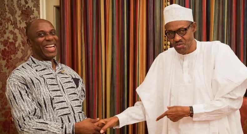 Minister of Transportation, Rotimi Amaechi and President Muhammadu Buhari (Daily Post)