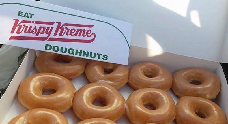 Krispy Kreme is selling a dozen doughnuts for a dollar.