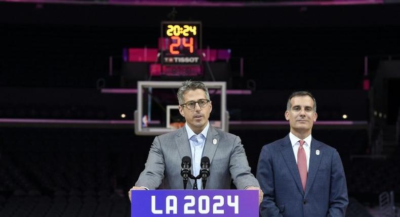 LA 2024 Chairman Casey Wasserman (L) and Los Angeles Mayor Eric Garcetti hold a news conference in May 2017