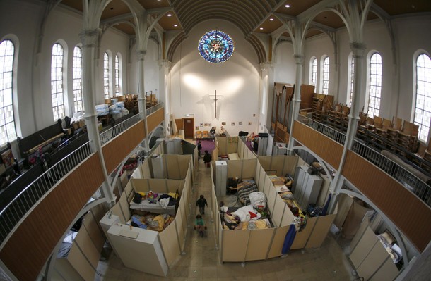 Bunk beds for migrants are set up inside a Protestant church in Oberhausen