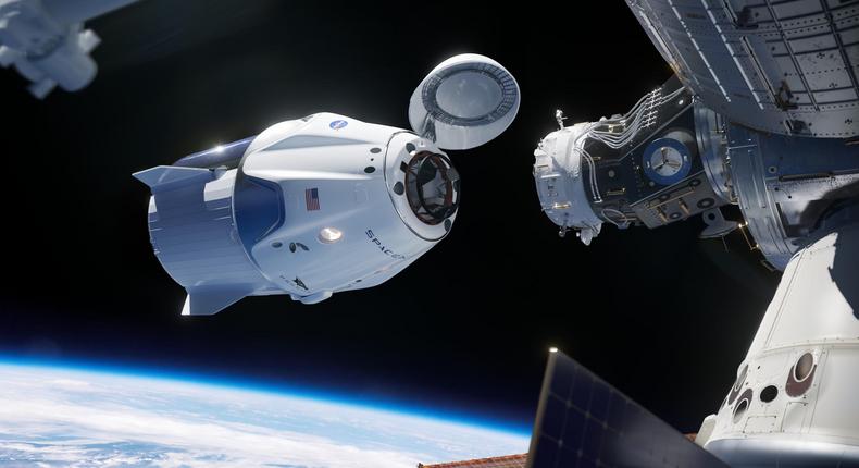 spacex crew dragon v2 spaceship international space station docking approach nasa 130608600 N05_h