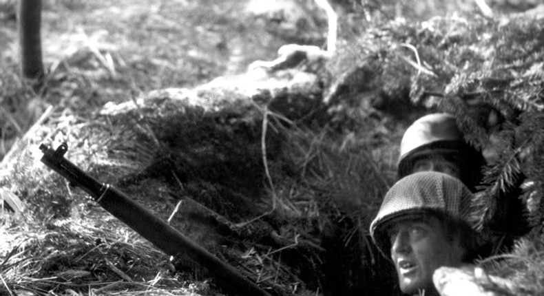 This file photograph taken in December 1944, shows US soldiers somewhere on the western Front during the German troops drive into the US lines during The Battle of The Bulge