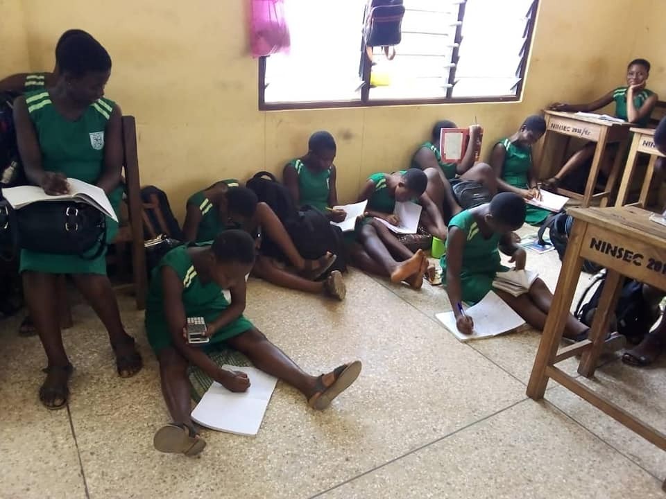 Photos Lack of furniture forces Ningo SHS students to sit on bare