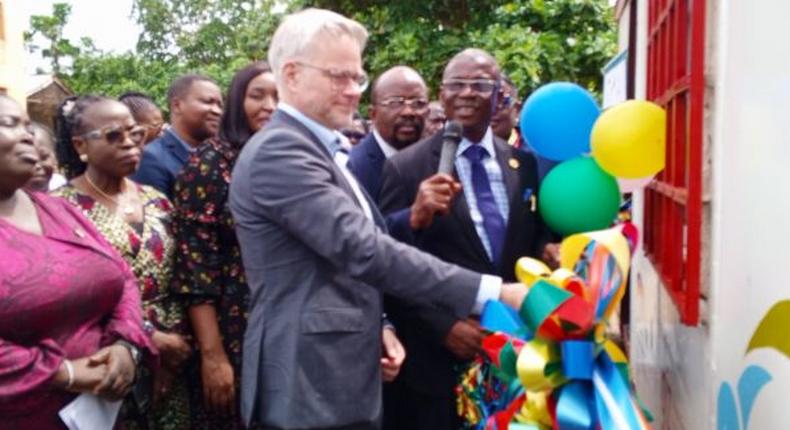 L-R: Mr Markus Wauschkuhn, Head of Programme, GIZ-SEDIN, Mr Abayomi Abolaji, Permanent Secretary, Lagos State Ministry Of Education and others at the opening of a lab cabin donated to Meiran Community Senior High School, Lagos State, by the GIZ-SEDIN on Thursday.