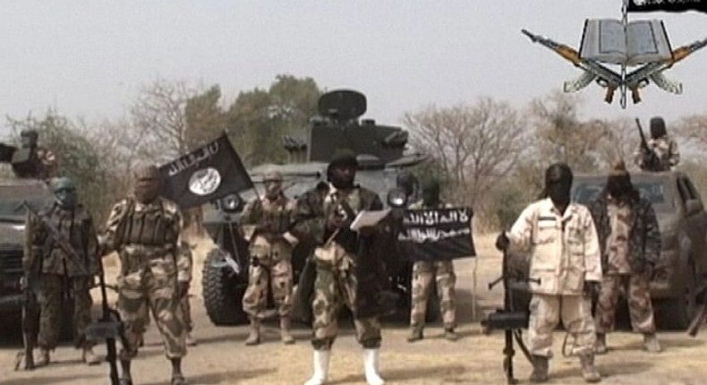 The sect leader Abubakar Shekau, flanked by his subordinates.