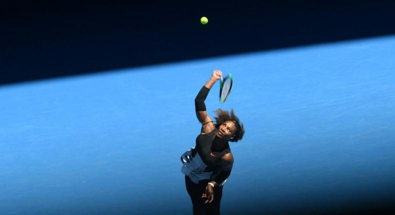 Serena Williams of the US serves against Nicole Gibbs of the US during their women's singles third round match on day six of the Australian Open tennis tournament in Melbourne on January 21, 2017