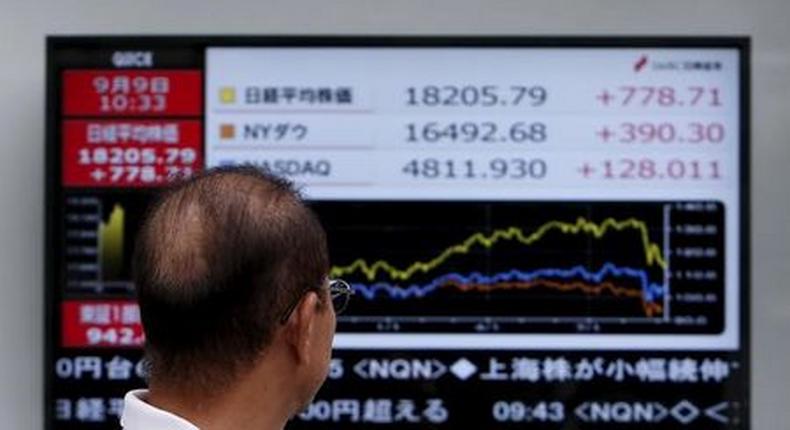 Asian shares slump on global growth concerns, U.S. selloff