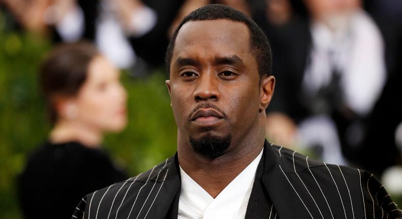 Sean Diddy Combs was spotted pacing at the Miami airport after the raid [REUTERS/Lucas Jackson]
