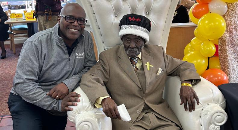 Charlie Lentz (right) pictured at his 105th birthday celebrations at a Bojangles restaurant in Winston-Salem, North Carolina, with Bojangles regional manager Horace Spencer (left).Courtesy of Bojangles