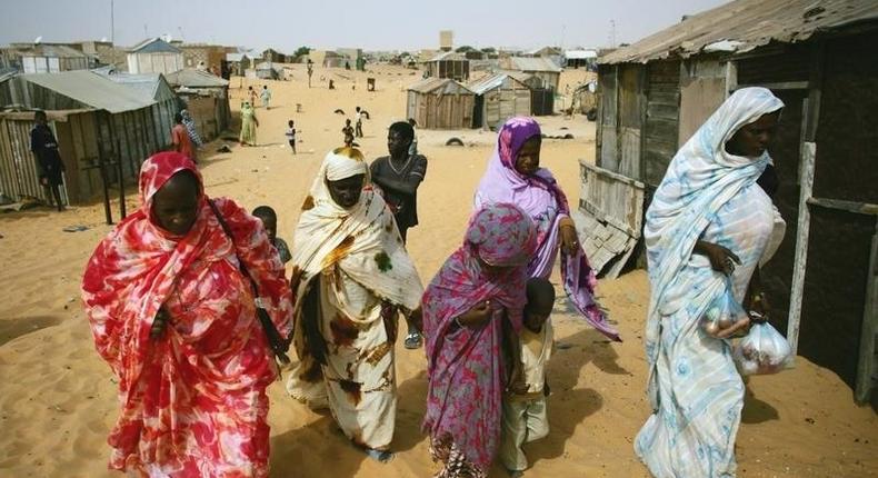 Mauritanians ex-slaves walk in a suburb outside Mauritania's capital Nouakchott, file. REUTERS/Rafael Marchante