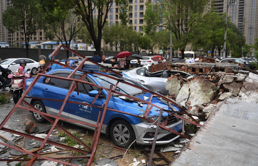 Cars are partially submerged in floodwaters after Typhoon Lekima hit Dajing town in Wenzhou, Zhejian