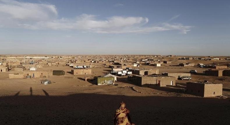 An indigenous Sahrawi woman walks at a refugee camp of Boudjdour in Tindouf, southern Algeria March 3, 2016. REUTERS/Zohra Bensemra