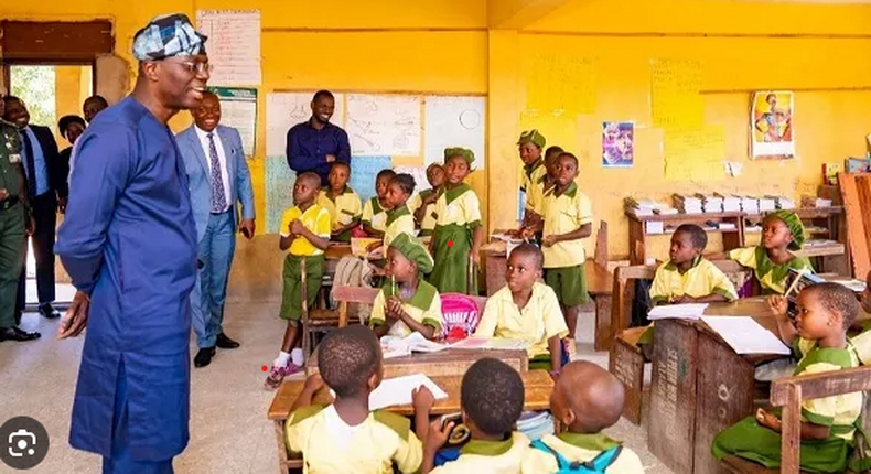 Governor Babajide Sanwo-Olu in a classroom with pupils [The Realm News}