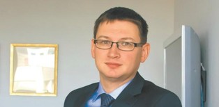 Grzegorz Szymański w Arval Polska. Finansista wjechał na górę