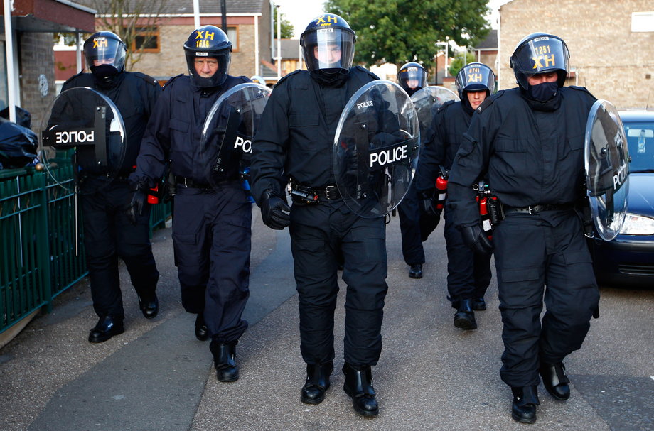 Riot police officers in east London on August 9, 2011.