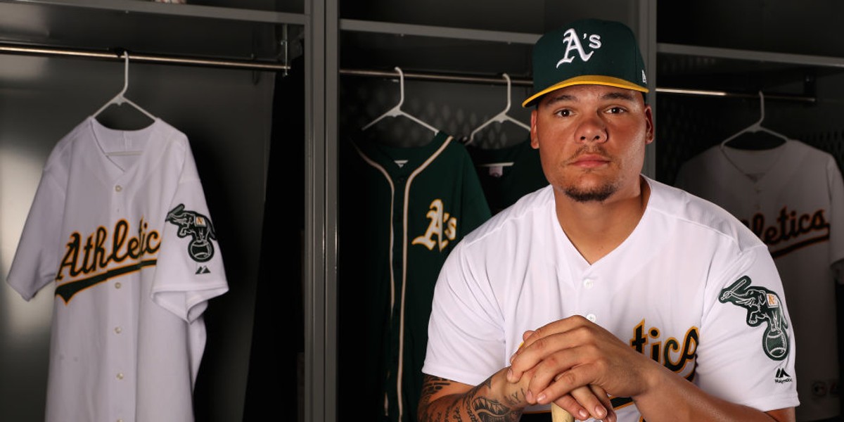 'Highly patriotic' A's catcher becomes first MLB player to kneel during anthem in response to Trump