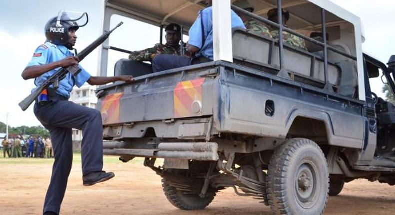 File image of police officers on duty. Lukenya Assistant County Commissioner Ms. Elizabeth Karitu has been interdicted for allegedly losing the keys to a container in which which the upcoming national examination papers are stored