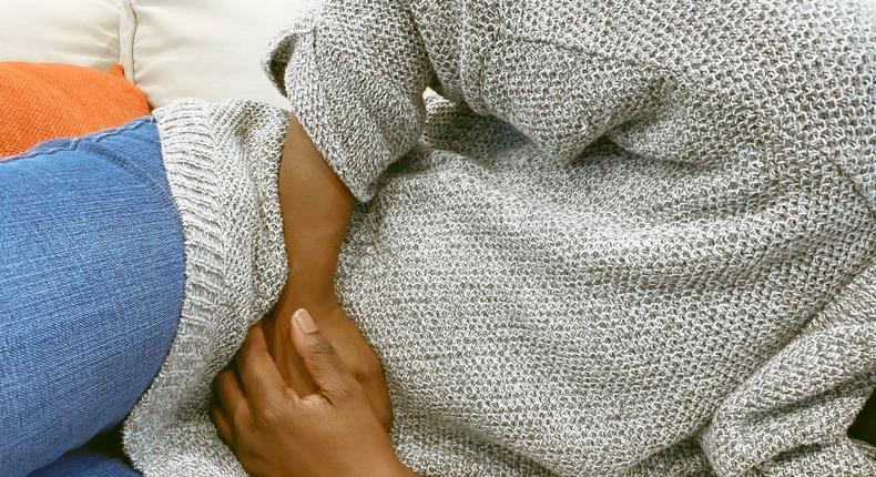 Abdominal pain is a common symptom of colon cancer.Getty Images