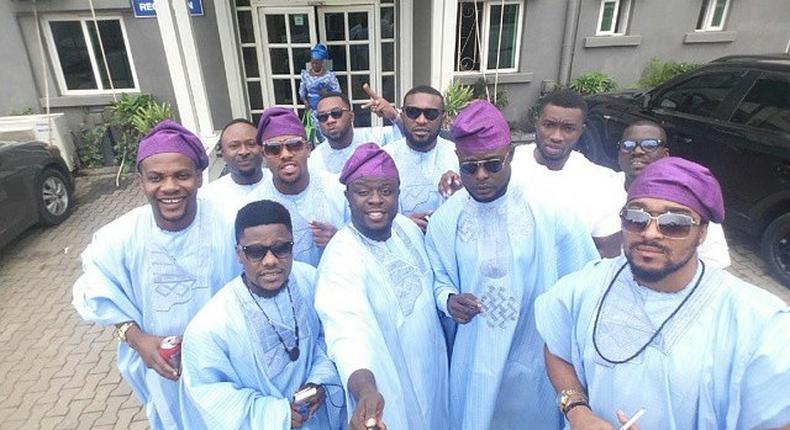 Groomsmen in their light blue Yoruba attire ready to support Gbenro Ajibade as he weds his lover, Osas Ighodaro