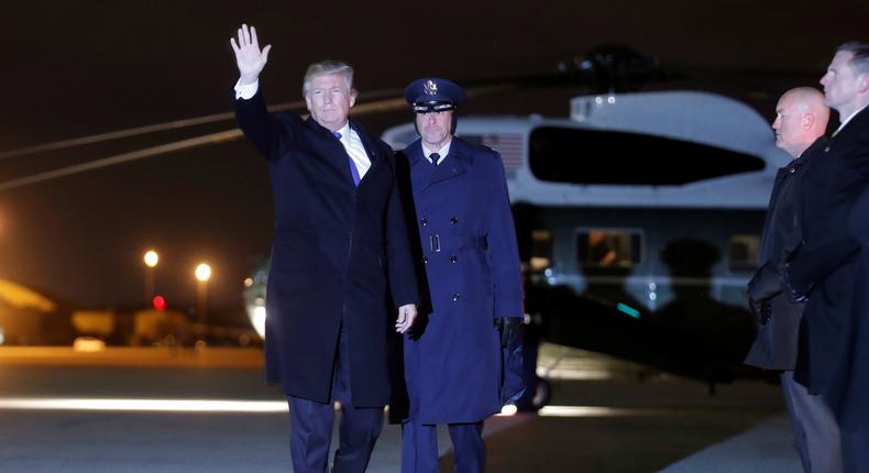 Trump davos flight wave