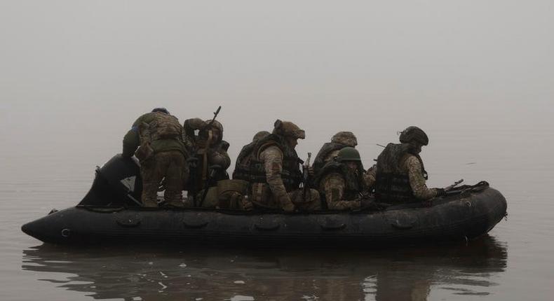 Ukrainian marines sail along the Dnipro river at the frontline near Kherson, Ukraine, Saturday, Oct. 14, 2023.AP Photo/Alex Babenko