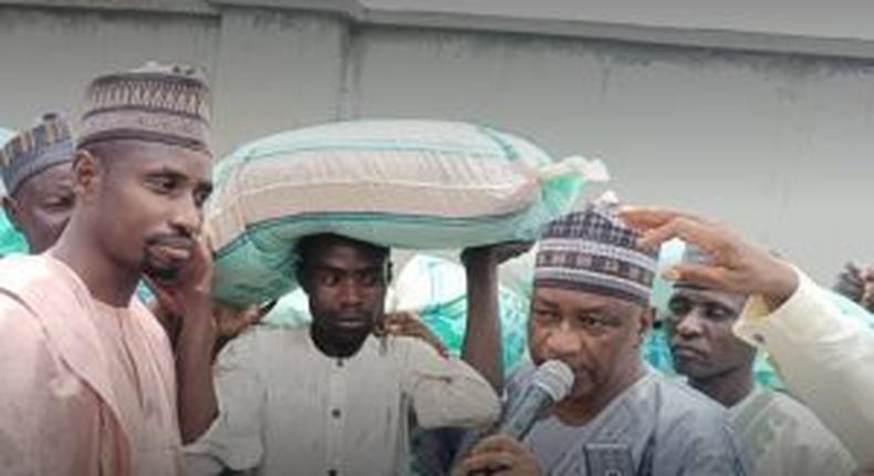 Former Zamfara Commissioner for Education, Alhaji Ibrahim Danmalikin-Gidangoga representing Lawmaker-elect for Bungudu/Maru Federal Constituency, Alhaji Abdulmalik Zubairu during the inauguration of sale and distribution of subsidised fertilizer to farmers from 21 Wards of Bungudu and Maru local government areas of the state. [NAN]