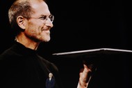 Apple's Tim Cook speaks during a product launch event in Cupertino