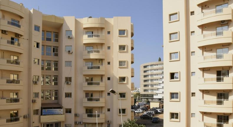 Housing boom: New apartment blocks are being built in Dakar, but spiralling rents make living there a distant dream for many