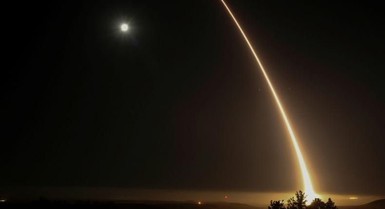 A streak of light trails into the night sky as the US military test fires an unarmed intercontinental ballistic missile (ICBM) at Vandenberg Air Force Base, California on May 3, 2017