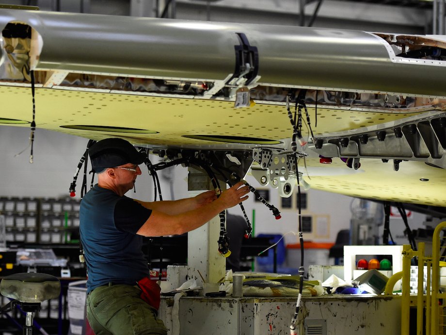 A man works on a C Series aeroplane wing in the Bombardier factory in Belfast, Northern Ireland September 26, 2017.