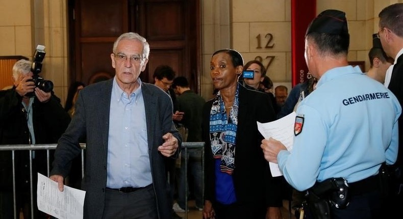 Genocide hunters Alain Gauthier (L) and his wife Dafroza Gauthier (R) arrive at the Paris Court House in Paris, France, May 10, 2016, on the first day of the trial of two former Rwandan local officials for their alleged participation in the 1994 genocide. 