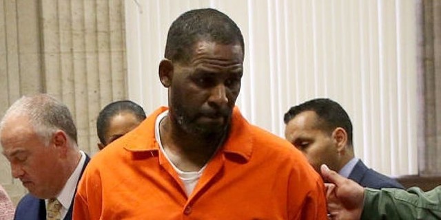 R. Kelly sentenced to 30 years for racketeering, sex trafficking [ClaudeCarter]