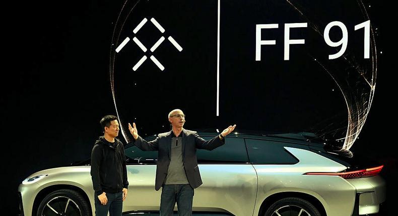 LeEco founder and CEO Jia Yueting, left, with Nick Sampson, Faraday Future's senior vice president of research and development and engineering.