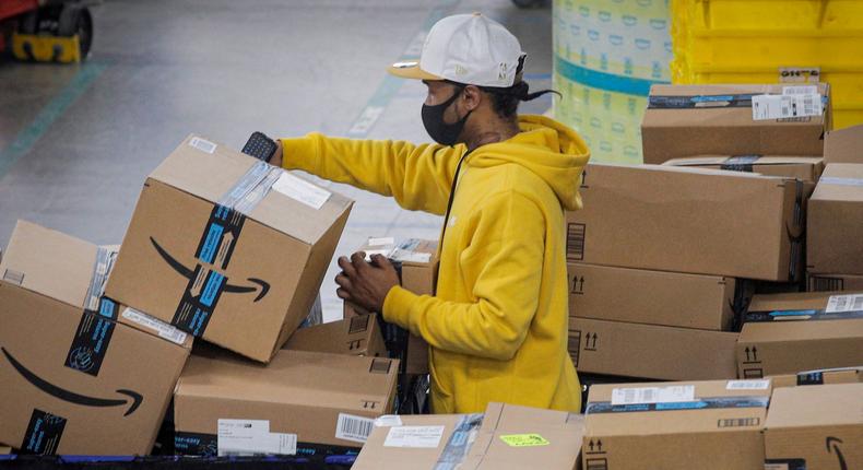 Amazon warehouse workers in the US no longer need to wear masks if fully vaccinated against COVID-19.
