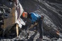 A resuce worker, seen in this picture made available to the media by the French Interior Ministry works near debris from wreckage at the crash site of a Germanwings Airbus A320, near Seyne-les-Alpes