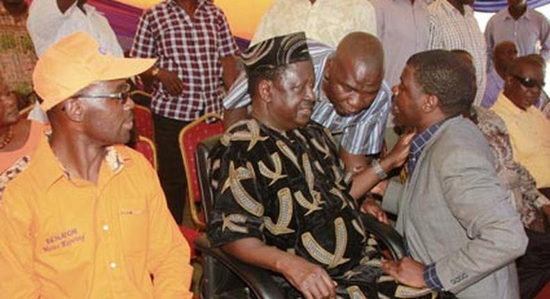 ODM leader Raila Odingawith TJ Kajwang’ and Mr Moses Kajwang’