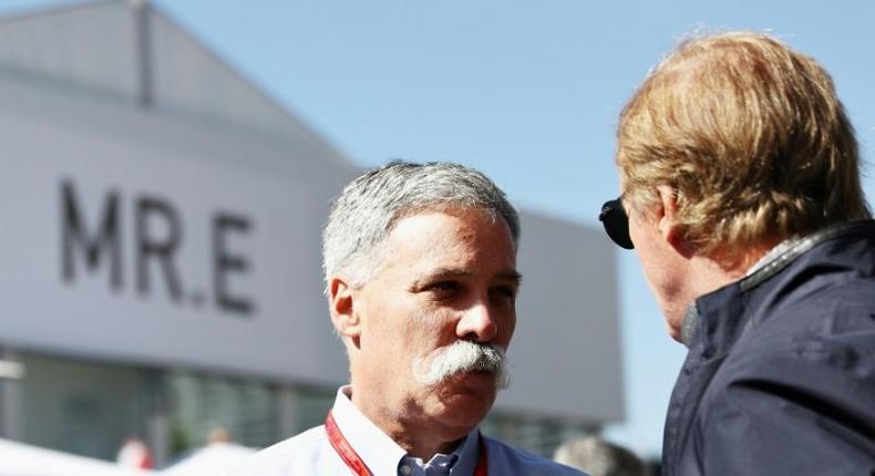 Chase Carey (L), new chairman and chief executive of the Formula One Group, told the BBC that F1 needs to be run differently than for the last four or five years