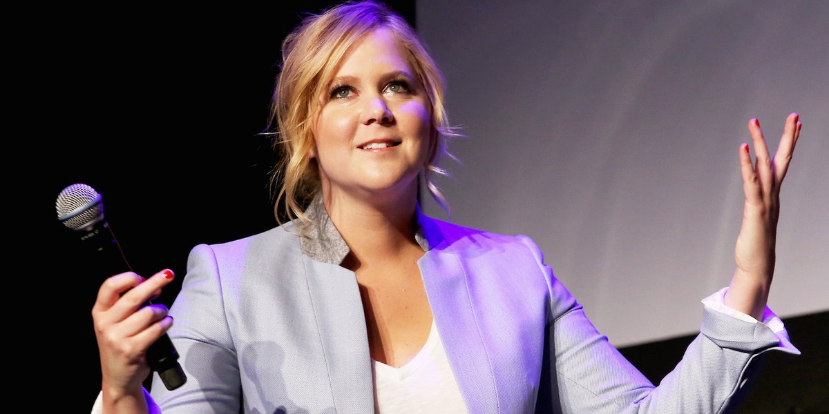 Hundreds of people walked out of an Amy Schumer comedy show after she mocked Donald Trump