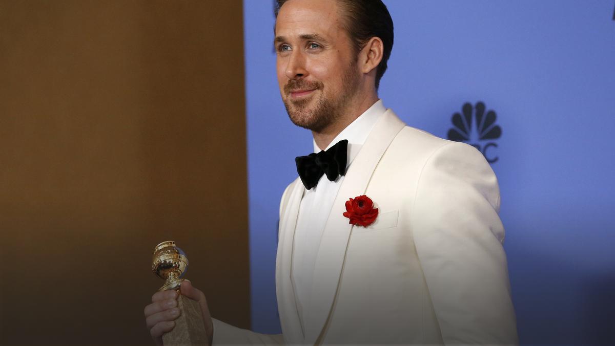Ryan Gosling holds his award during the 74th Annual Golden Globe Awards in Beverly Hills