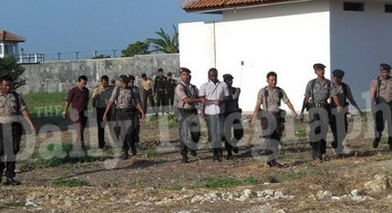 Nigerian drug trafficker Samuel Iwachekwu Okoye is taken from his cell to meet with prosecutors two days before he was executed on Nusa Kambangan Island, Central Java on June 26 2008.