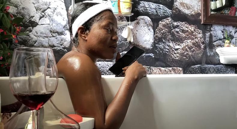 MzBel grants interview from her bathtub