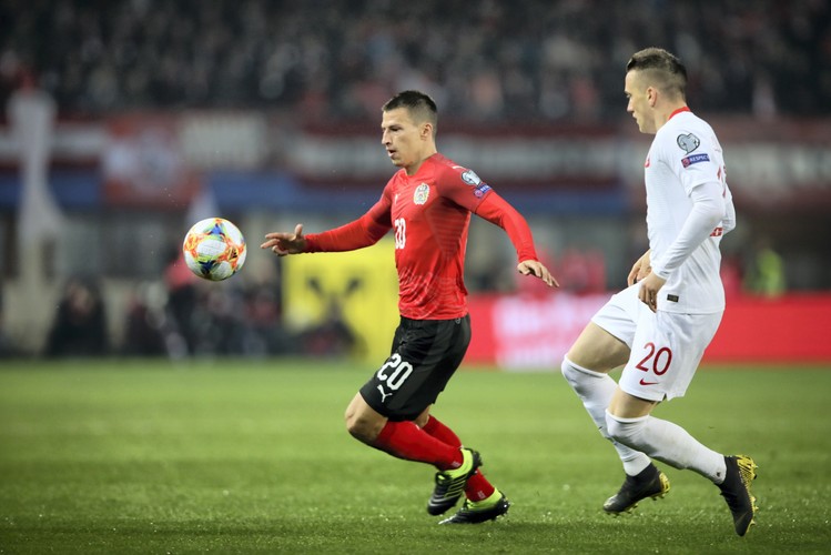 Piotr Zieliński (P) i Valentino Lazaro (L)